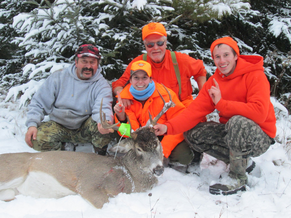 Three generations of a Wisconsin family with a nine-point buck. Wisconsin Department of Natural Resources/Flickr, CC BY-ND
