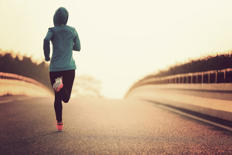  Up and at it. Female runner image via www.shutterstock.com. 